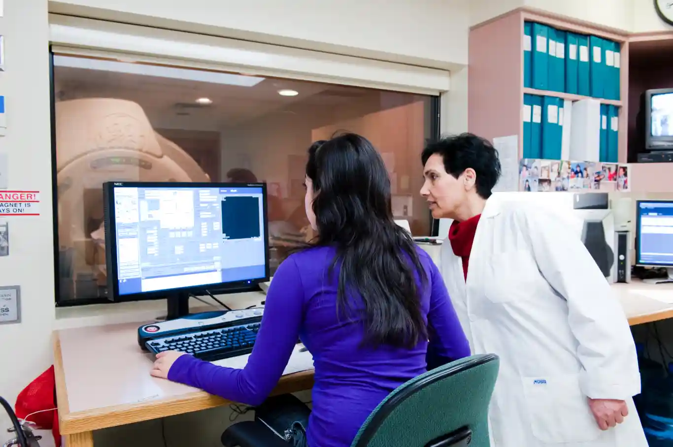 2 doctors looking at a monitor
