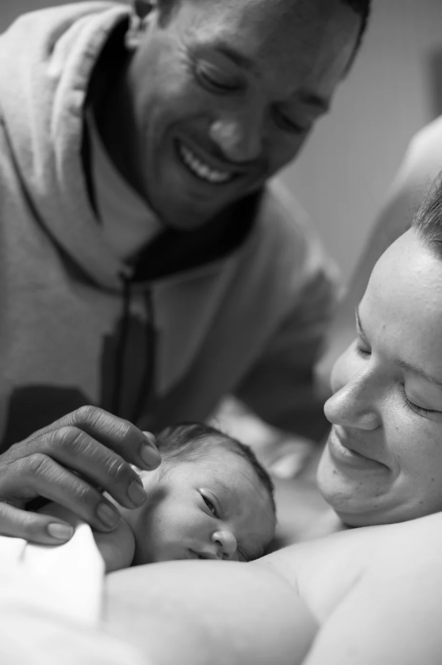 Newborn baby with parents